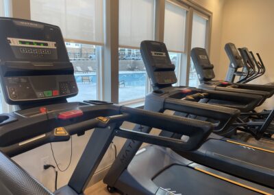 Interior photo of the fitness center at Marcella at Gateway Apartments in Bon Air, Virginia